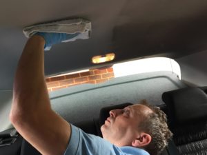 ProSteamUK - Removing nicotine from a car - headlining half cleaned